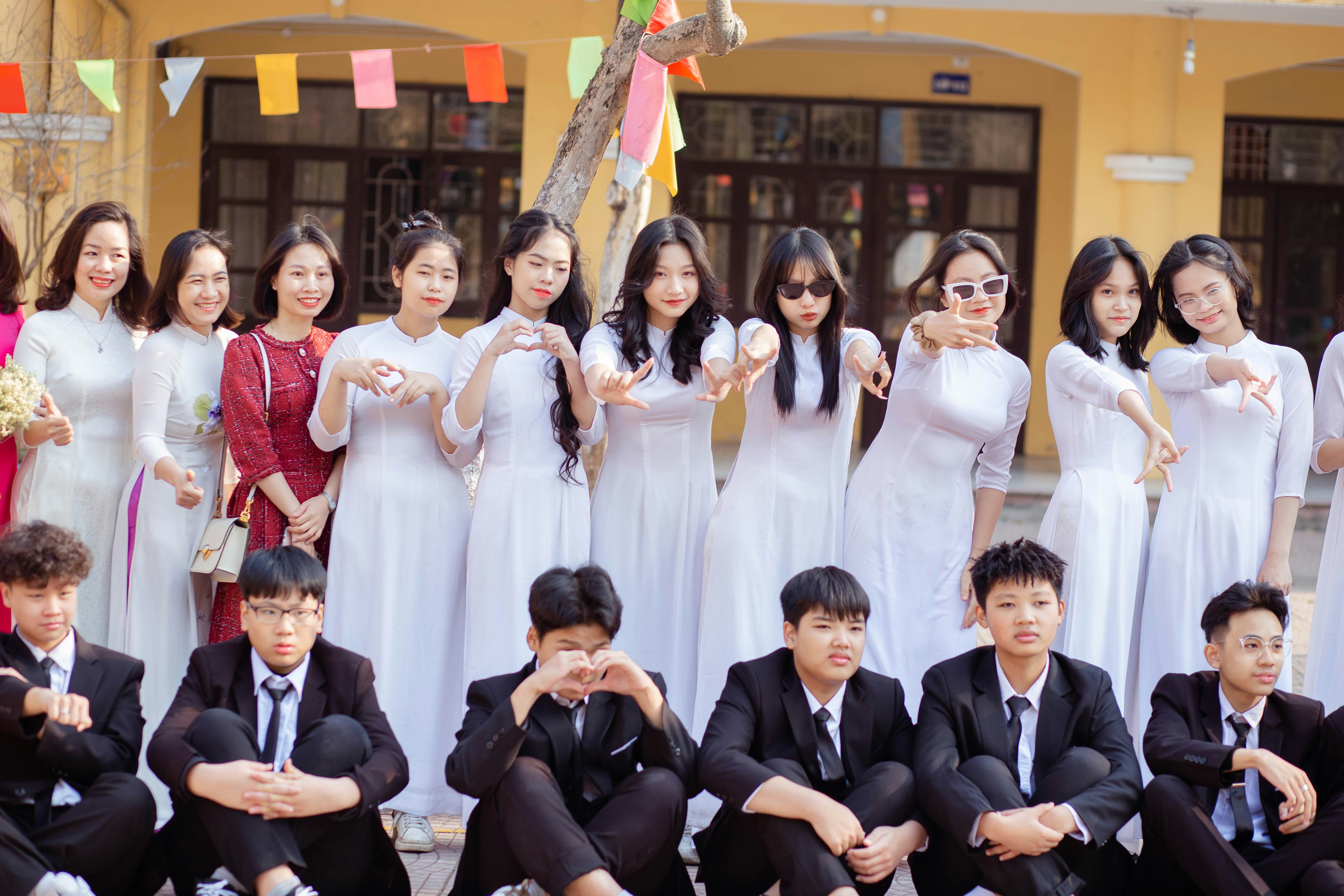 a group of young people posing for a picture