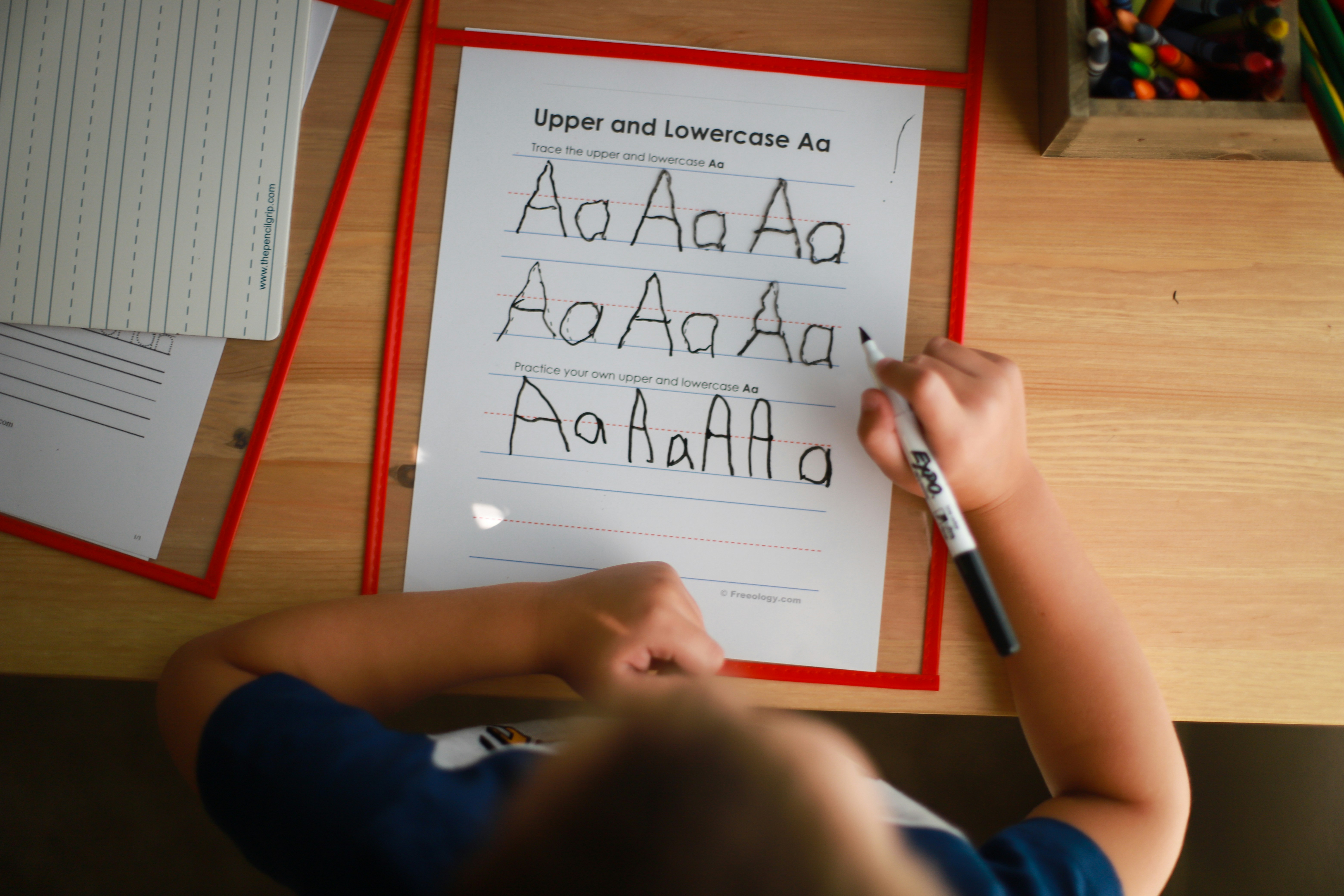 🔚 Conclusion: Bringing Your School Drama Script to Life by School Play Scripts a young boy writing on a piece of paper