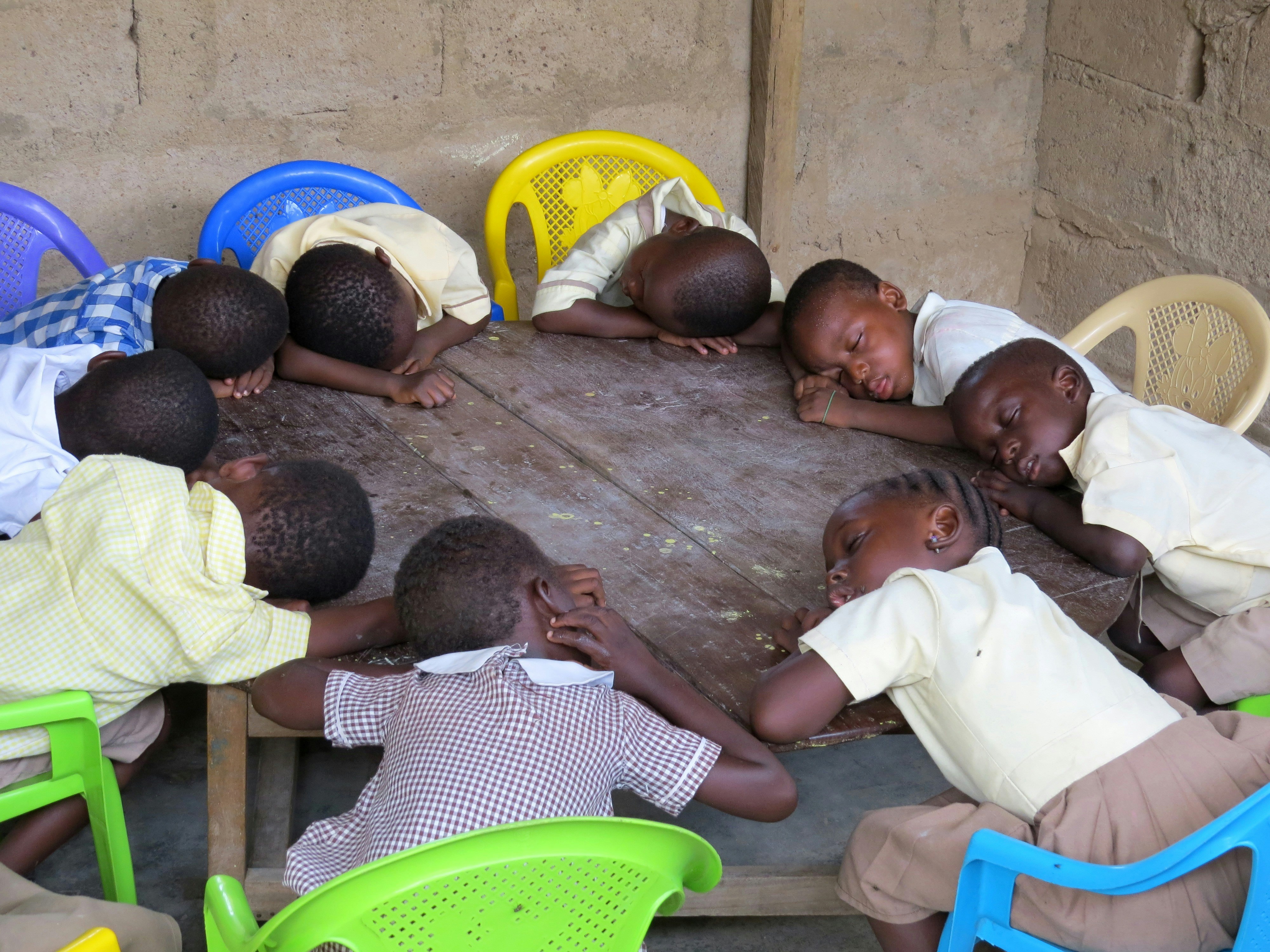 children playing on brown wooden floor