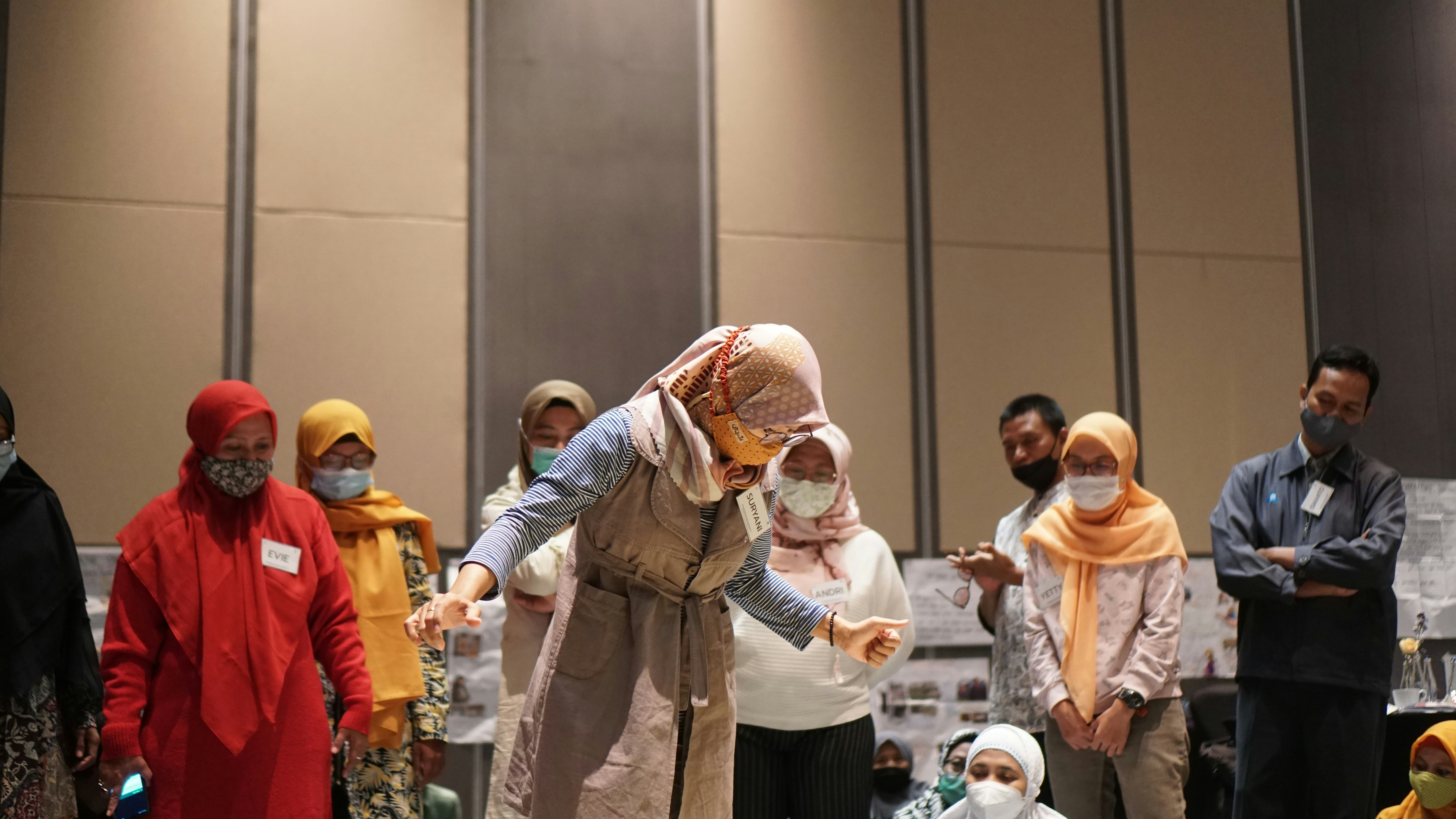people standing and walking on street during daytime