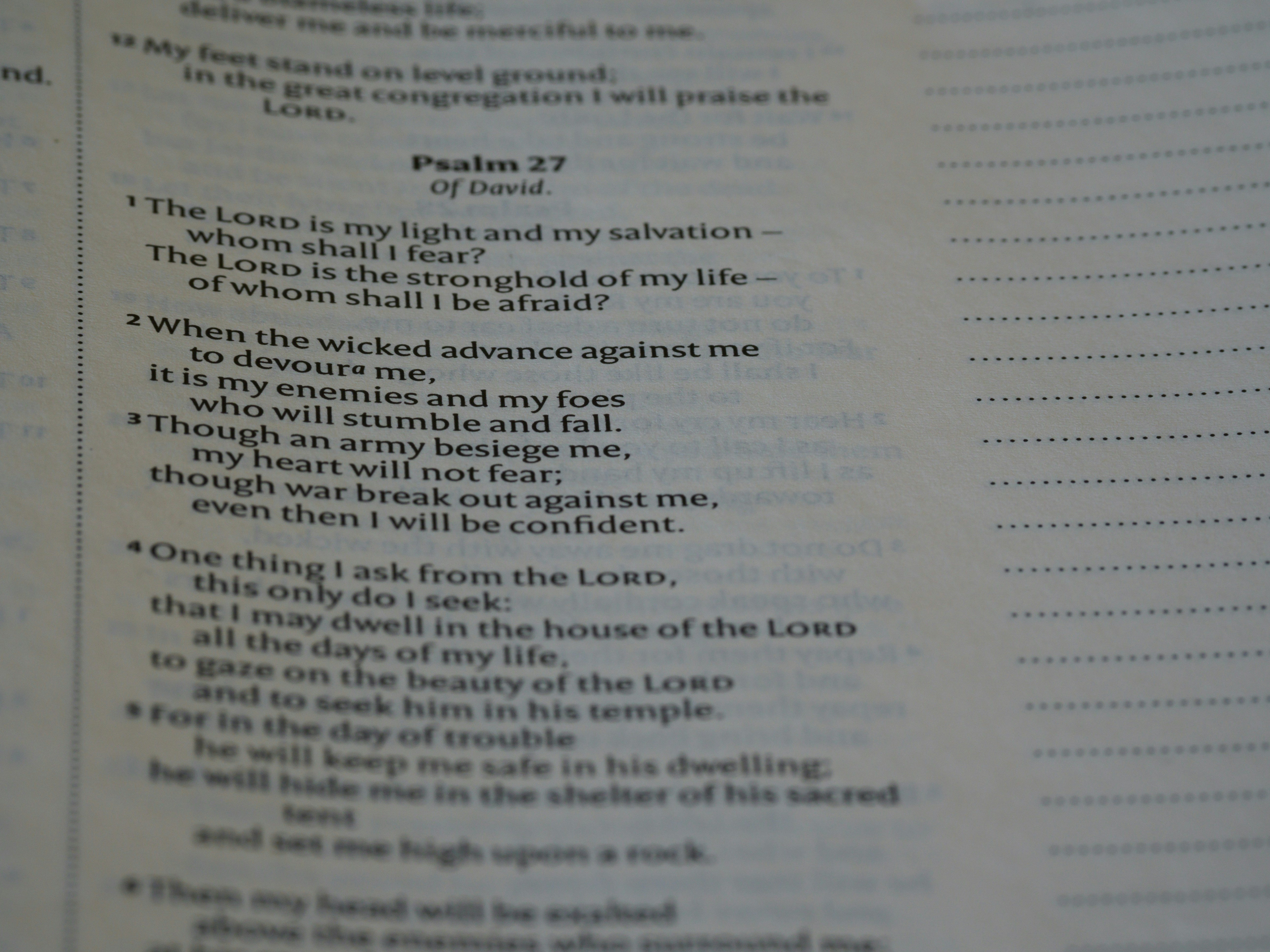 a close up of a book with a poem on it