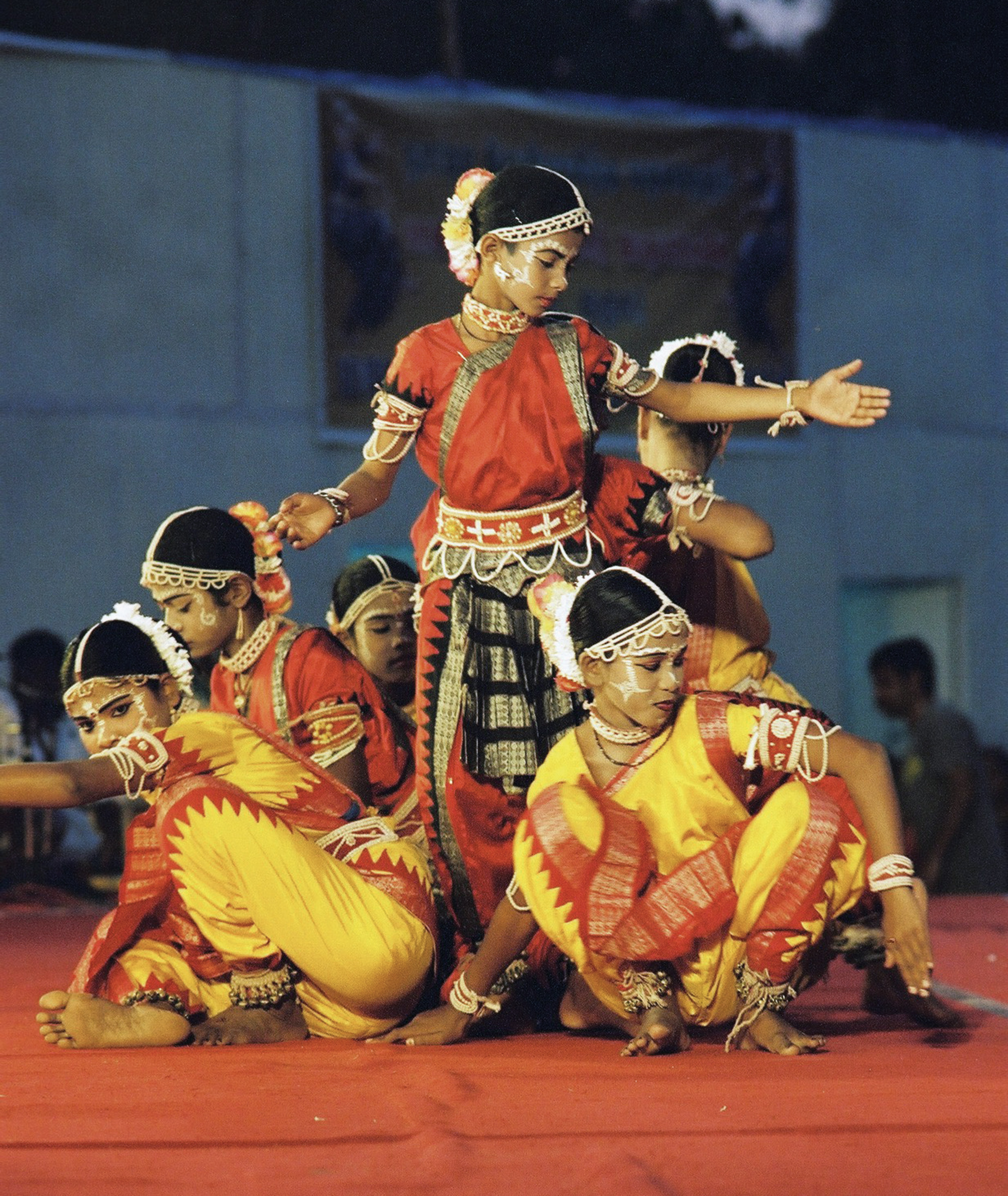 a group of people dressed in costume posing for a picture