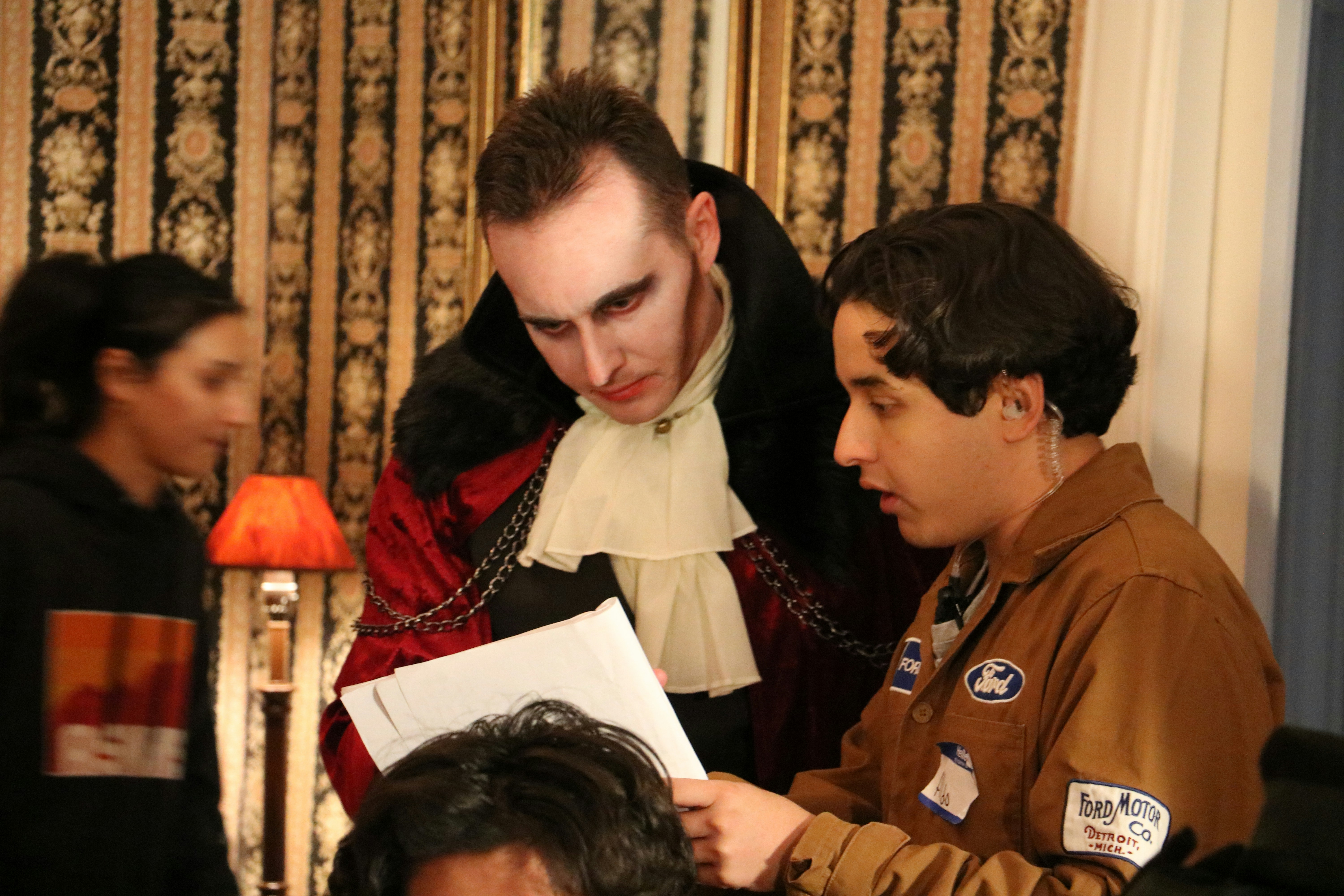 A group of people standing around each other