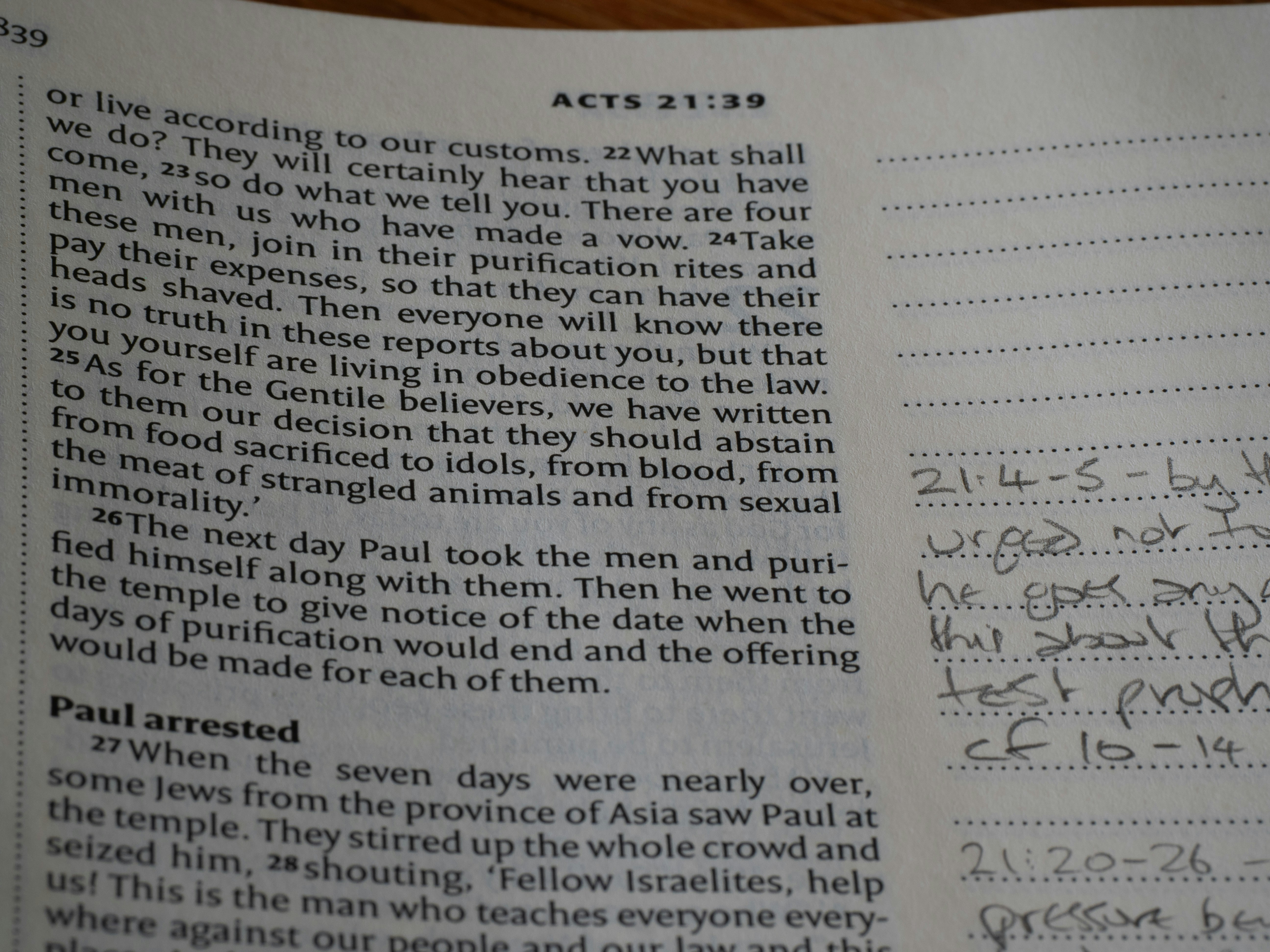 Close up, bokeh, bible, new testament, christian, history, text, reading, bible study, devotions, christianity, scripture, book of acts, acts, luke, by School Play Scripts A book with writing on it sitting on a table