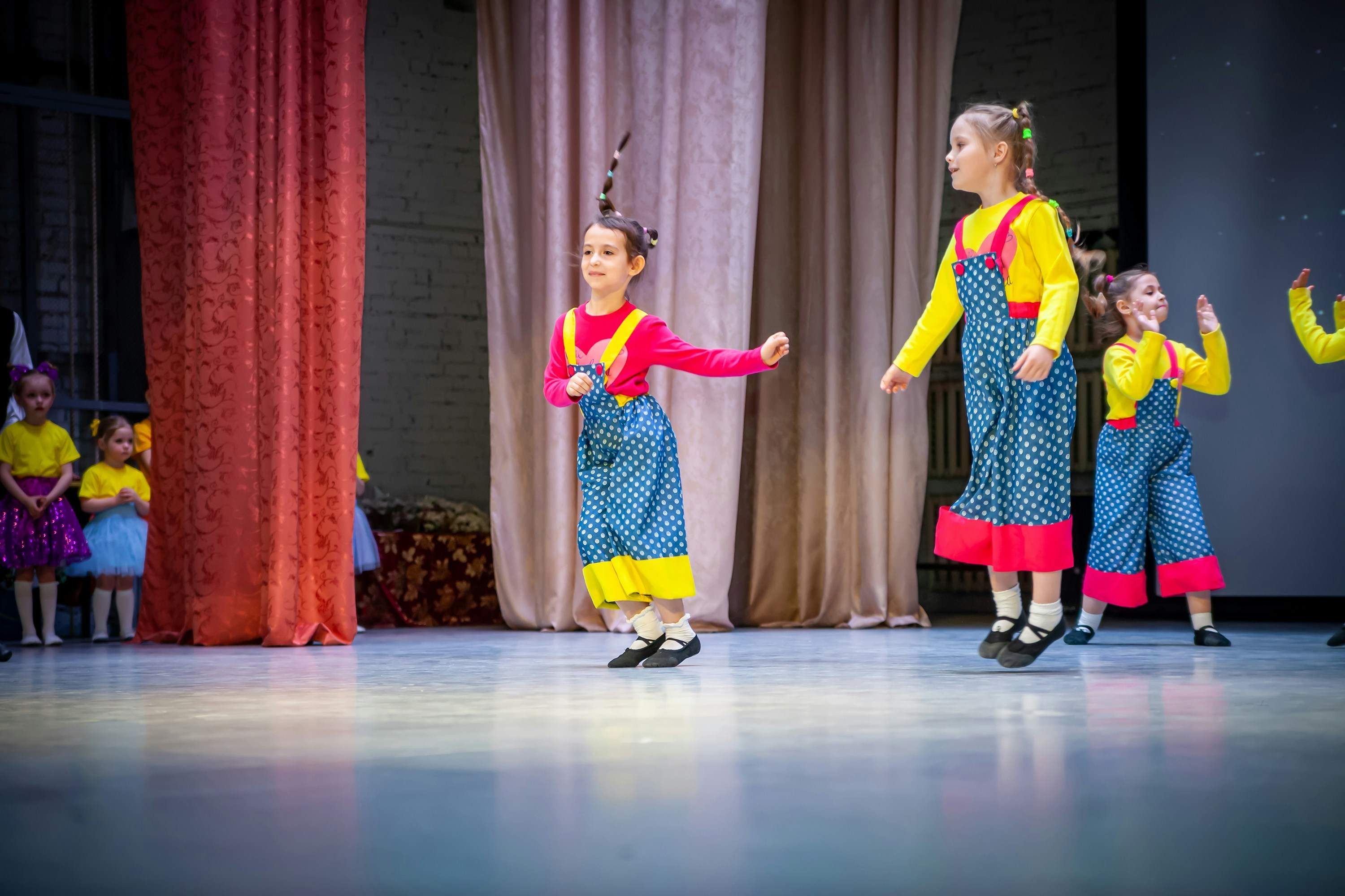 Conclusion by School Play Scripts a group of children performing on a stage