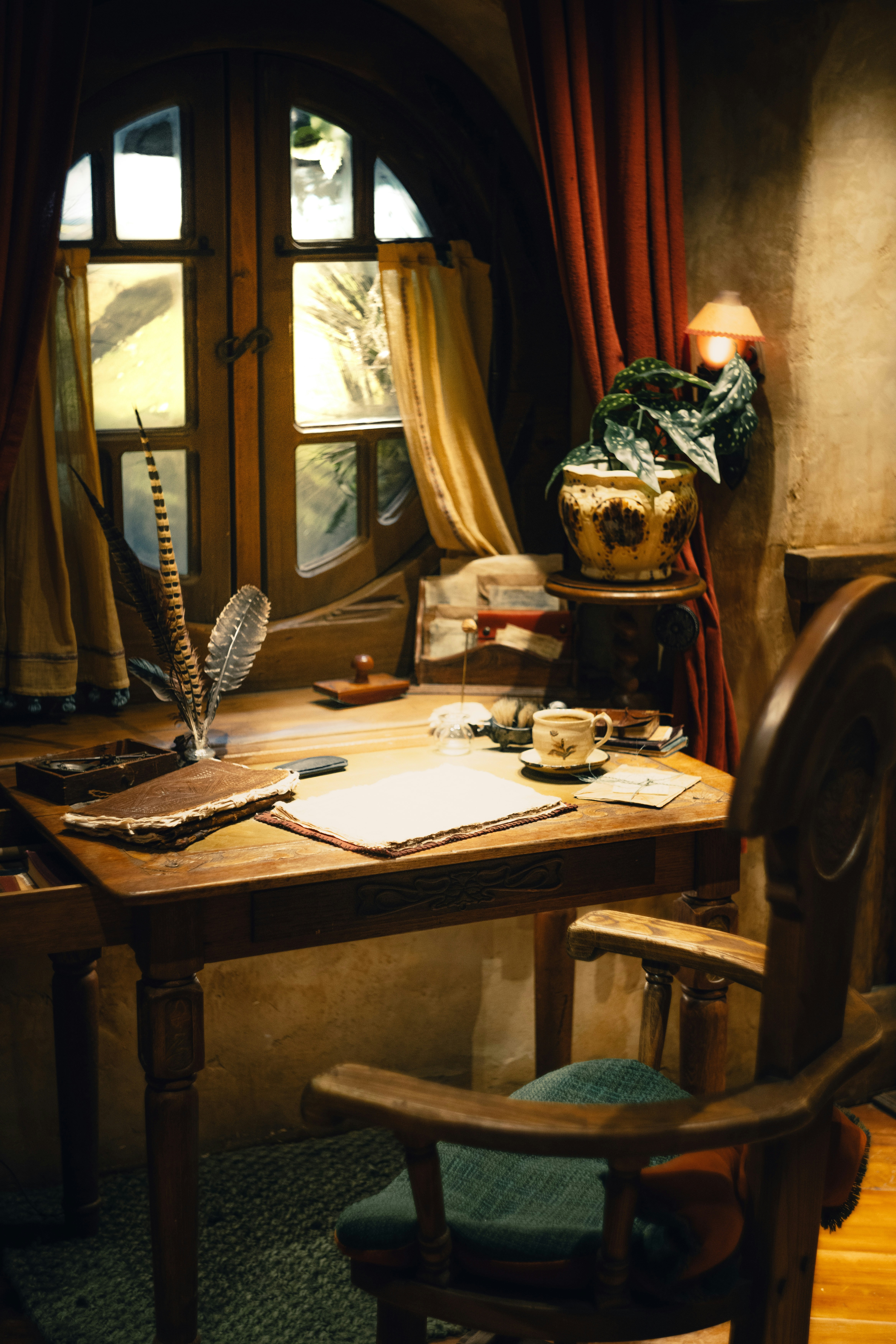 🎭 The Golden Age of Giggles: A Brief History of Comedy School Play Scripts by School Play Scripts A desk with a chair and a lamp on it