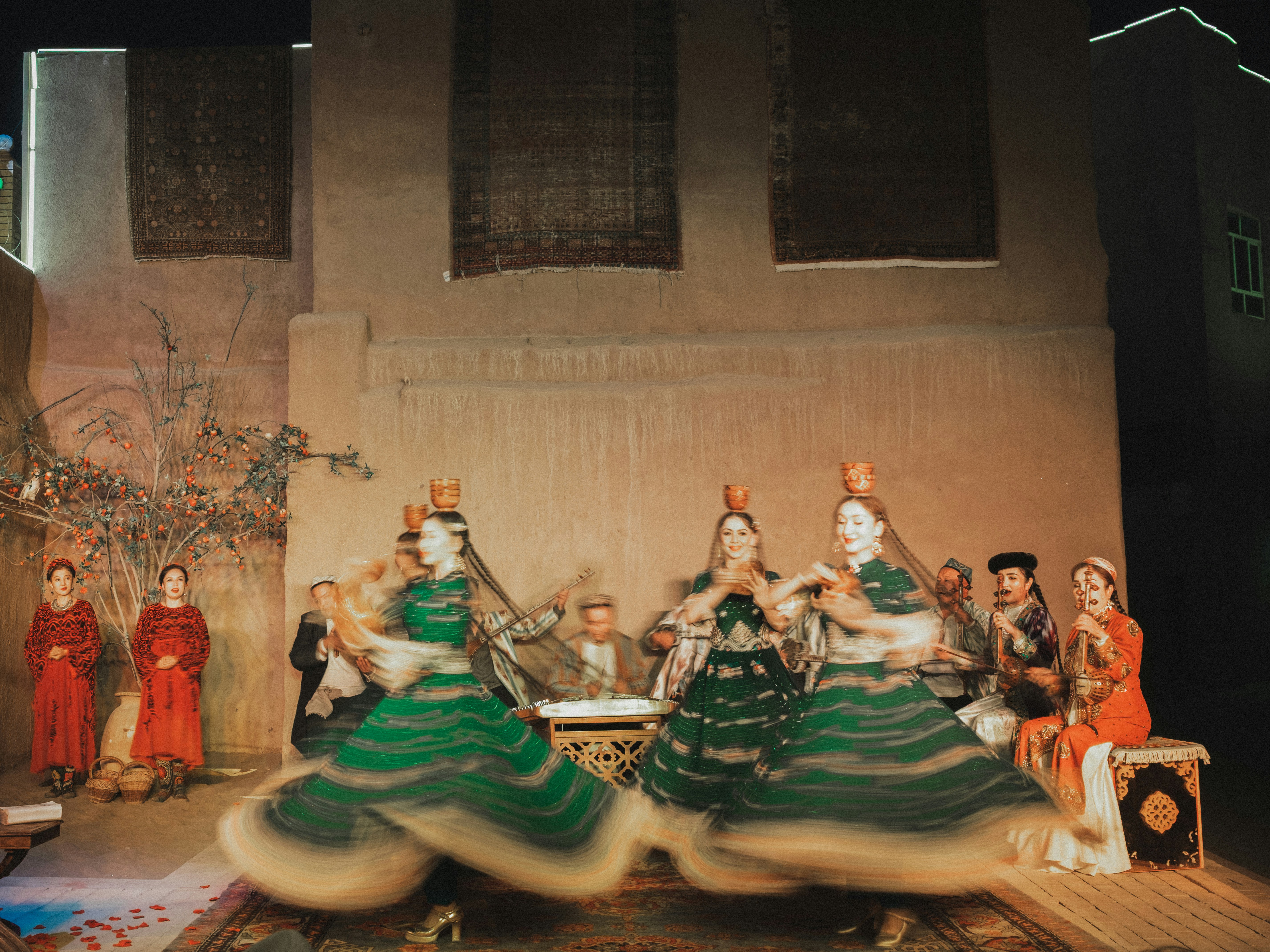 📜 A Brief History of Holiday Plays in Education by School Play Scripts Dancers in green dresses perform on stage.