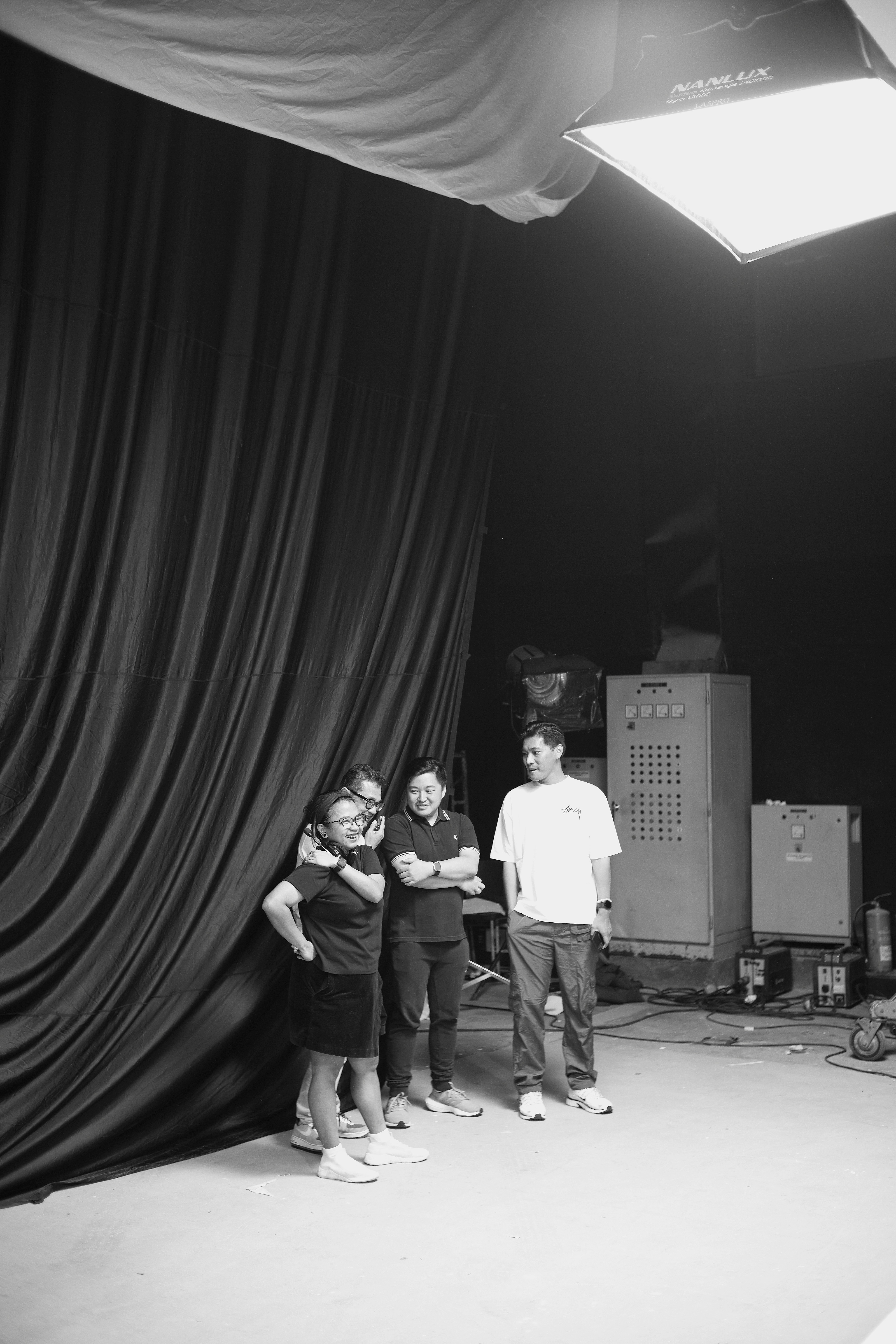 📜 From Puppet to Player: A Brief History of Student Agency in Theatre Creation by School Play Scripts A group of people standing in front of a black curtain