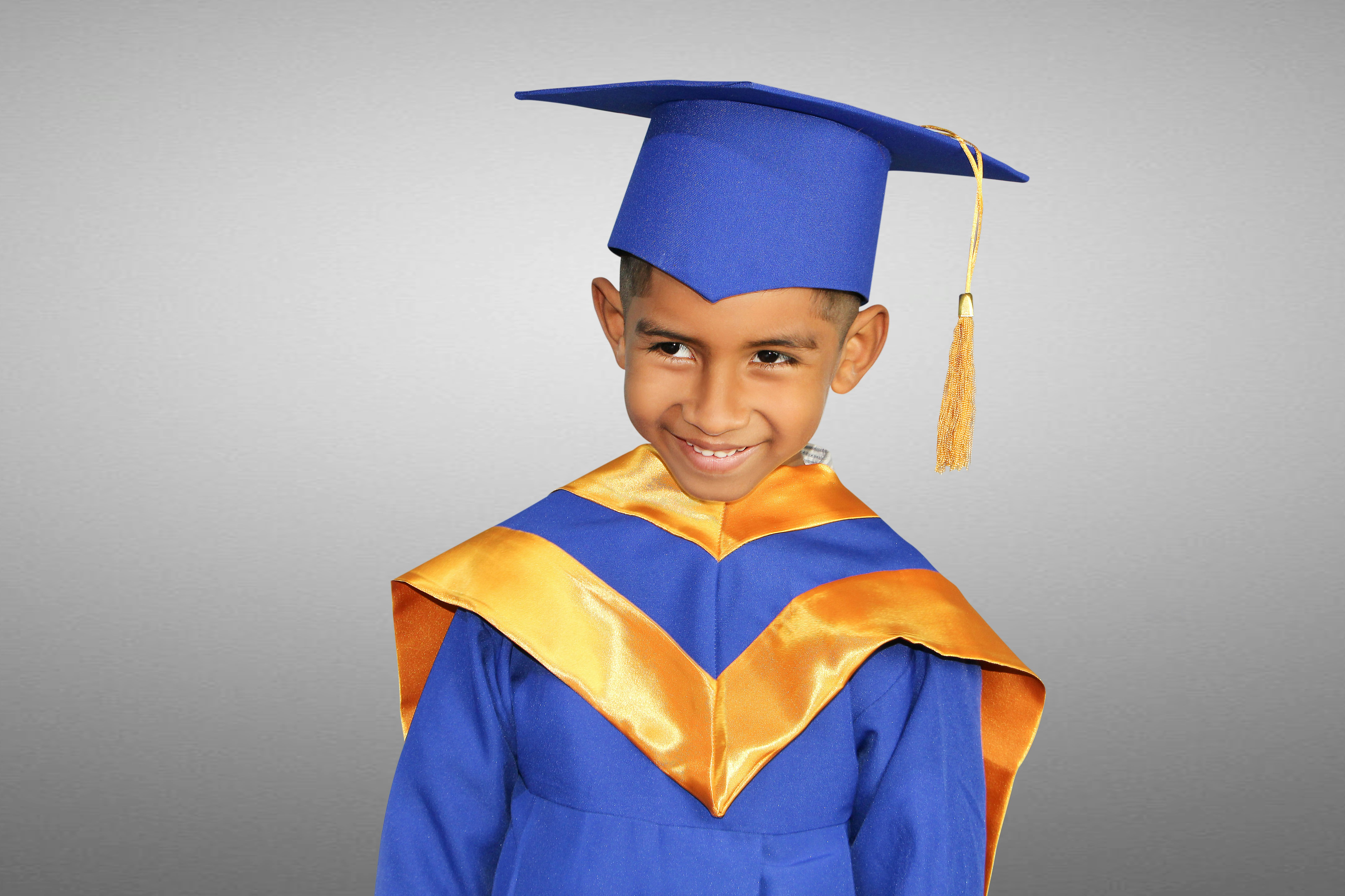 Peruvian child #peruvian #child #hildren #kid #promociĂłn by School Play Scripts a young boy in a blue graduation gown