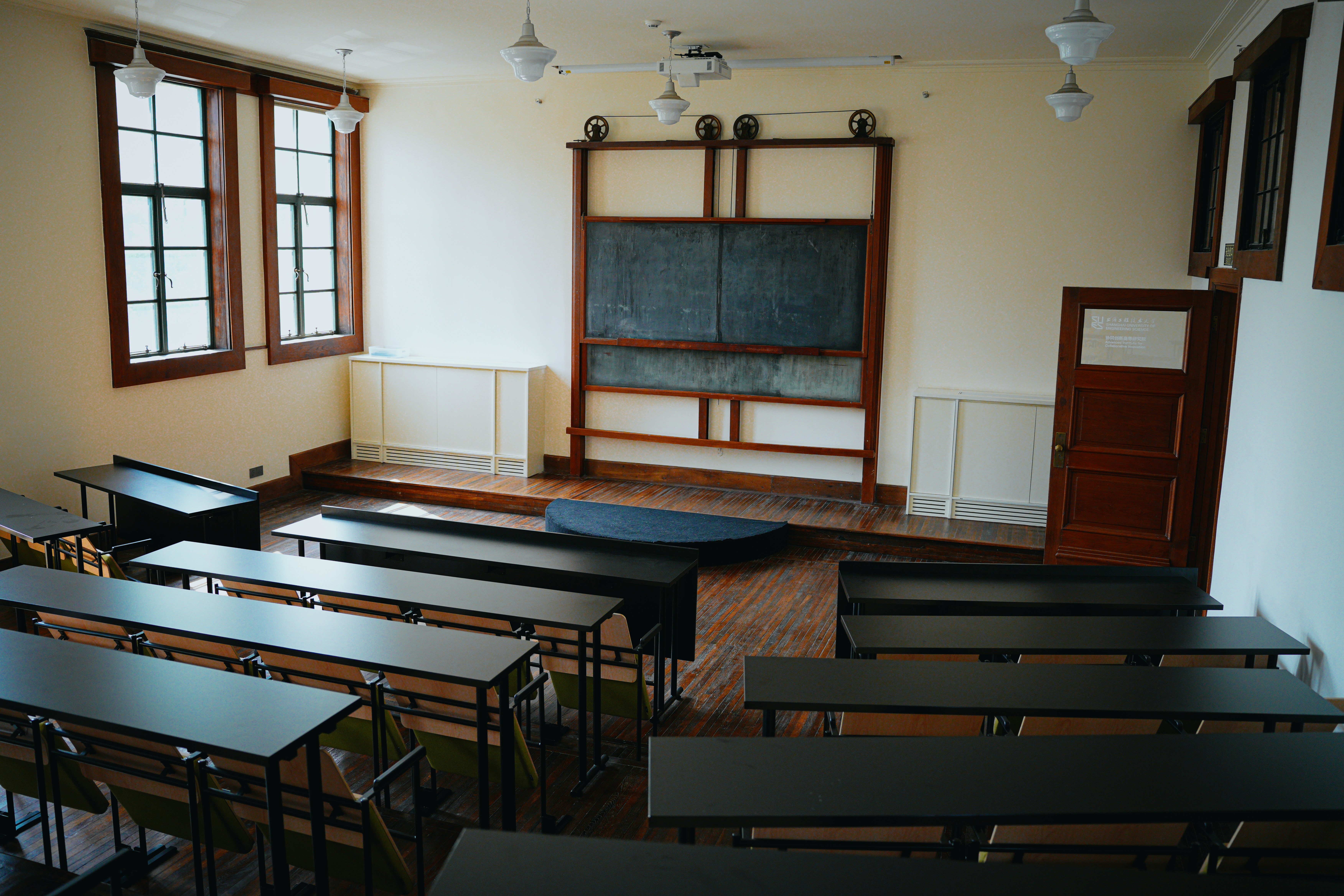 📜 A Brief History of School Play Scripts: From Classroom to Stage by School Play Scripts Empty classroom with wooden desks and blackboard